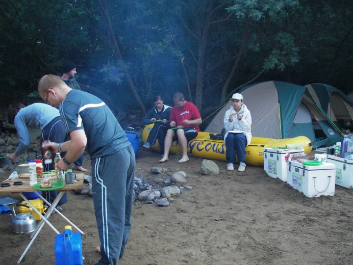 camping next to the river on our multi-day white water rafting trips on the Mkomazi River